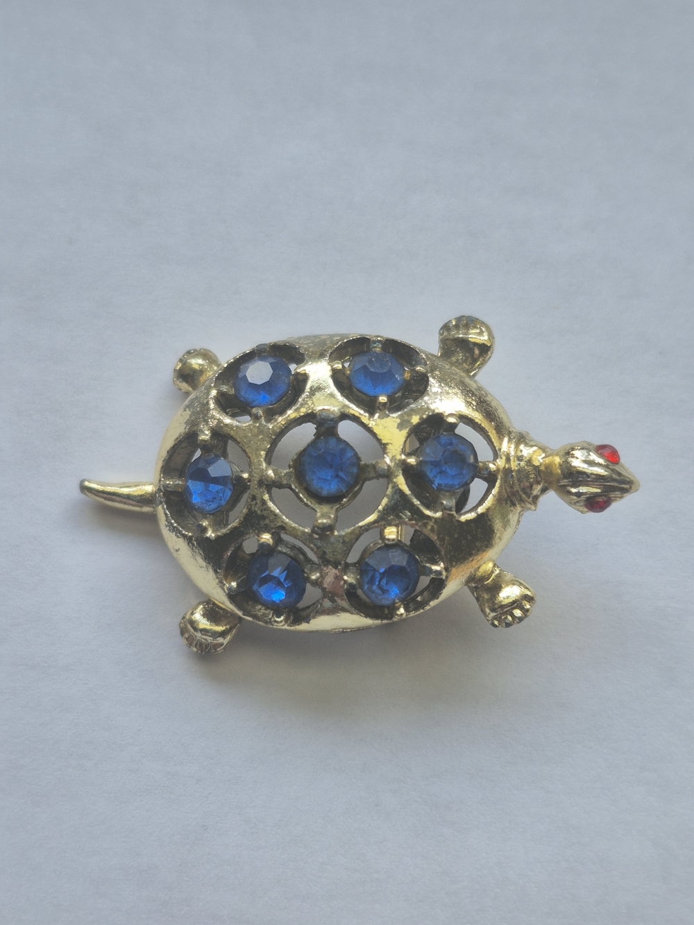 Vintage silver tone blue turtle brooch